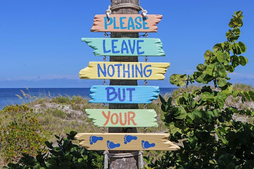 Leave nothing but your footprints signage